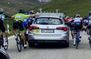 What sanctions and fines can be imposed on cyclists during a race?