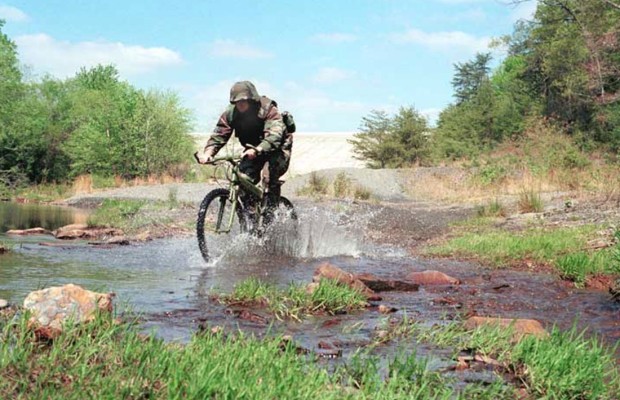 What influence has the military industry had on mountain biking?