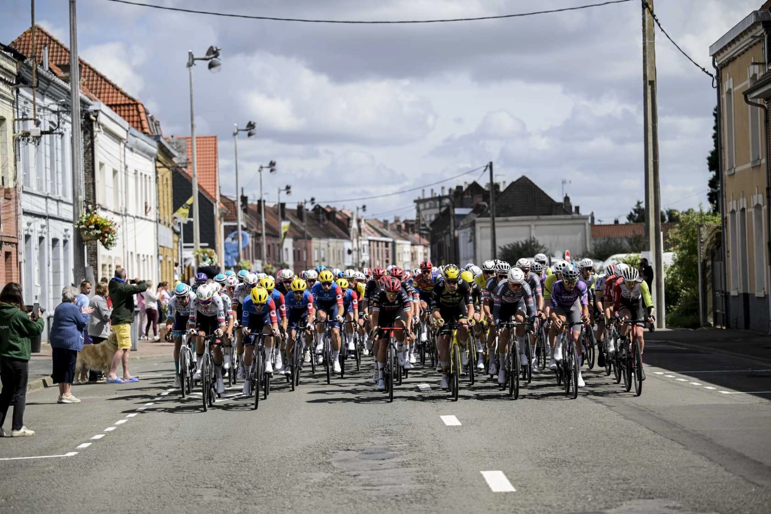 Tim Merlier wins a crash-filled 3rd stage of the Tour de France that saw Jasper Philipsen forced to retire