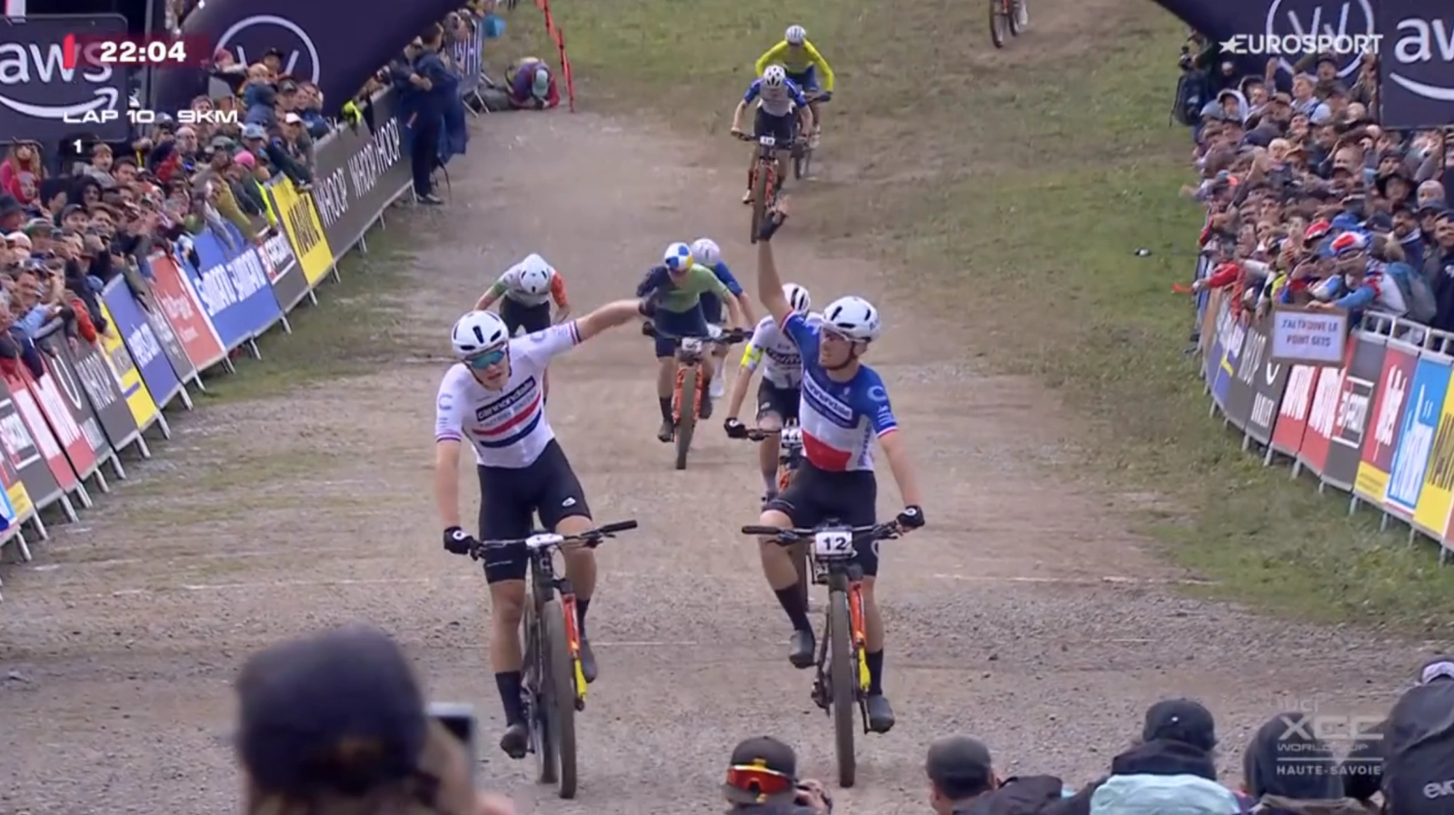 Jenny Rissveds and Charlie Aldridge show off their power to win the Short Track in Les Gets