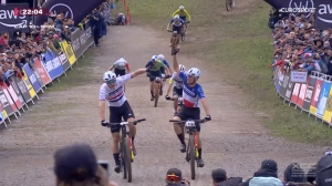 Jenny Rissveds and Charlie Aldridge show off their power to win the Short Track in Les Gets
